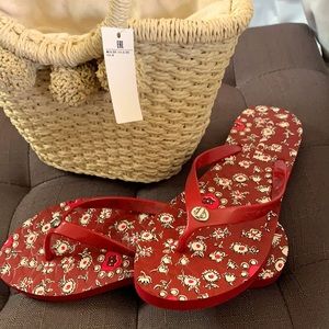 New Coach without tag/box red flip flops.